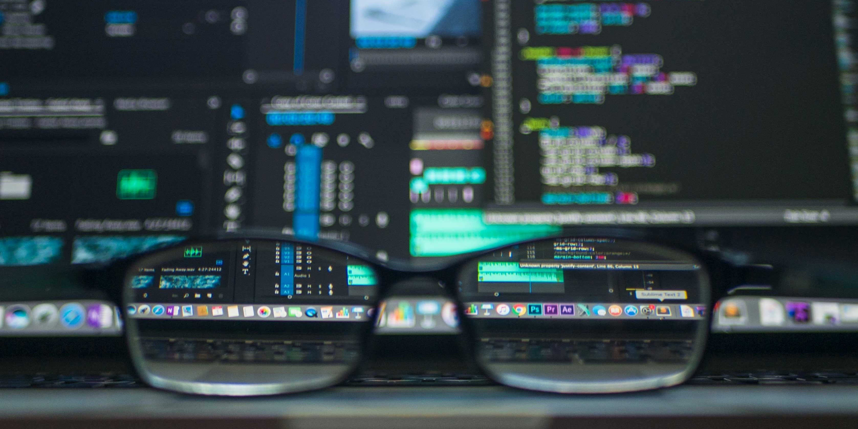 Reading Glasses in front of Screen